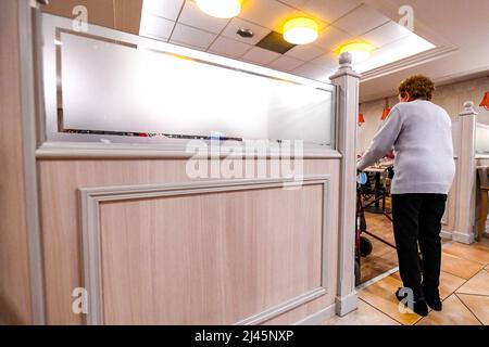Nursing home “EHPAD Les Cents Clochers” in Rouen (Normandy, northern France): elderly person using a Zimmer frame Stock Photo