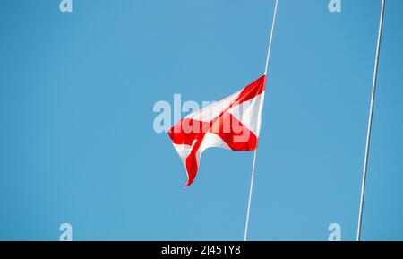 nautical signal flag on a boat moored in rio de janeiro, Brazil. Stock Photo