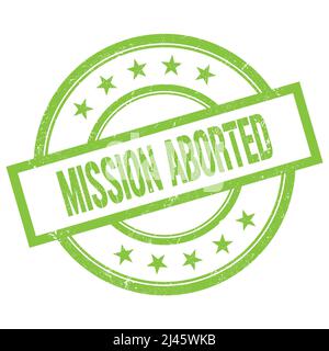 MISSION ABORTED text written on green round vintage rubber stamp. Stock Photo