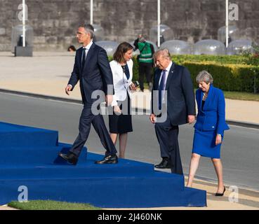 NATO Secretary General Jens Stoltenberg, US President Donald Trump and British Prime Minister Teresa May seen during the NATO military alliance summit in Brussels. Stock Photo
