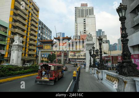 Manila, Philippines - March 2022: Manila Chinatown Welcome Arch on March 24, 2022 in Philippines. It is the largest Chinatown arch in the world. Stock Photo