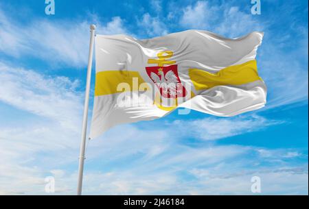 flag of Hospital ship, service yellow , Poland at cloudy sky background on sunset, panoramic view. Polish travel and patriot concept. copy space for w Stock Photo