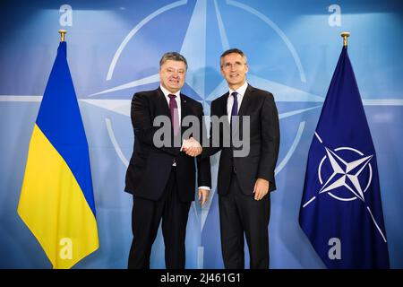 Brussels, Belgium. 20th Oct, 2016. President of Ukraine Petro Poroshenko and NATO Secretary General Jens Stoltenberg handshake during a meeting in Brussels. (Photo by Mykhaylo Palinchak/SOPA Images/Sipa USA) Credit: Sipa USA/Alamy Live News Stock Photo