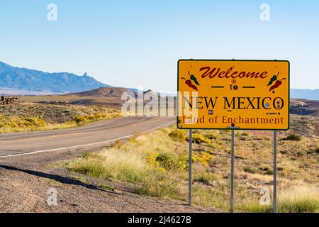 Teec Nos Pos, AZ - October 10,2021:  Welcome to New Mexico sign along the road at the state border in Teec Nos Pos, Arizona Stock Photo