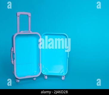 Fully opened blue suitcase, on a blue background, top view. Vacation, travel concept. copy space Stock Photo