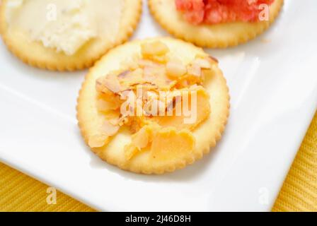 Round Buttery Cracker with Creamy Cheddar Cheese with Port Wine and Nuts Stock Photo