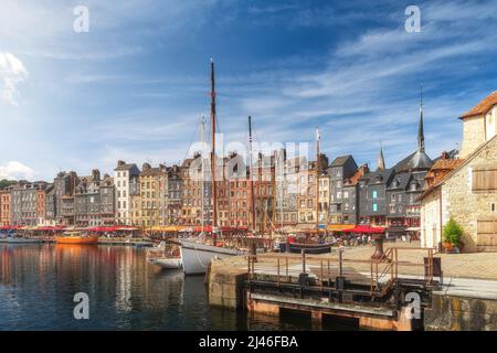The harbour of Honfleur port, Normandy, France with colorful buildings, boats and yachts. Popular french town Stock Photo