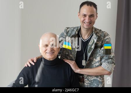 Ukraine patch flag on army uniform. Ukraine military uniform. Ukrainian troops Stock Photo