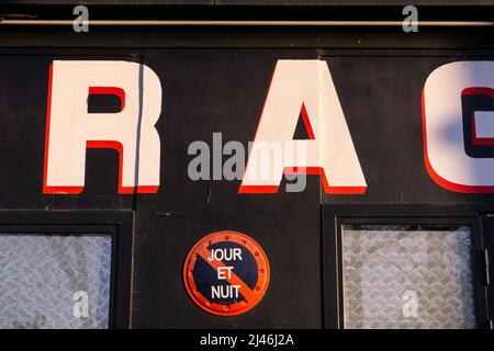 Sign prohibiting parking day and night on the wall Stock Photo