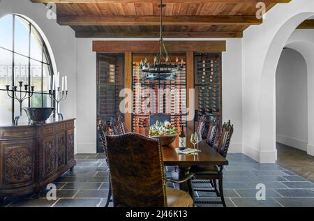 Formal dining room with wine cellar Stock Photo
