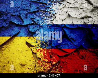 Russia vs Ukraine national flags pattern on grungy dry cracking earth, military conflict in Ukraine concept Stock Photo