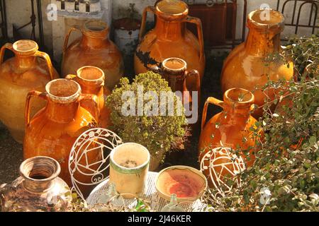 Traditional ochre glazed jars in Alberobello, Italy Stock Photo