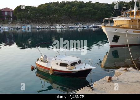 Mandre, Croatia, 26th Mart, 2022. Quiet relaxing scene in a rural harbor in a Croatian coastal village Mandre Stock Photo