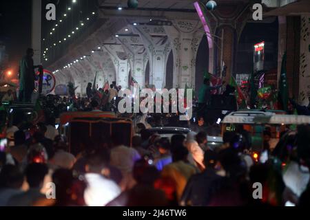 Rawalpindi, Pakistan. 10th Apr, 2022. (4/10/2022) PTI protests against ‘foreign conspiracy' against Imran Khan.Peaceful demonstrations are taking place across Pakistan including in Lahore, Sialkot, Sahiwal, Karachi and Rawalpindi. Former prime minister and Pakistan Tehreek-e-Insaf (PTI) Chairman Imran Khan earlier in the day had vowed to begin 'freedom struggle against a 'foreign conspiracy' of regime change in Pakistan in liaquat bagh muree road. (Photo by Zubair Abbasi/Pacific Press/Sipa USA) Credit: Sipa USA/Alamy Live News Stock Photo