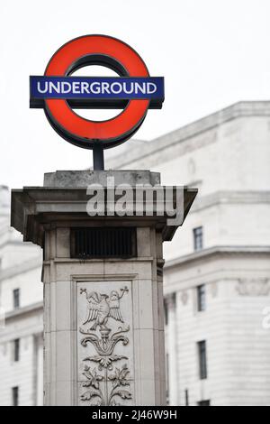 London Underground roundel sign on a plinth outside Bank Station in the City of London Stock Photo