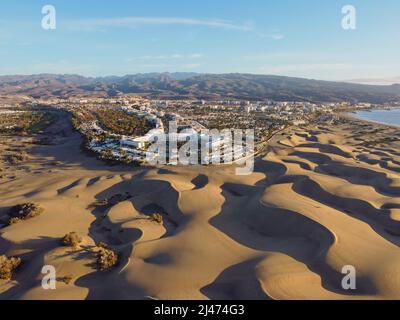 Aerial drone landscape of Maspalomas golden sand dunes at sunrise, Gran Canaria, Canary Islands, Spain Stock Photo