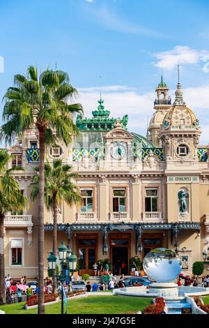 Monaco, Monte Carlo, 21 August 2017: Casino at sunset, mirror monument, a lot of tourist, architecture of principality Stock Photo