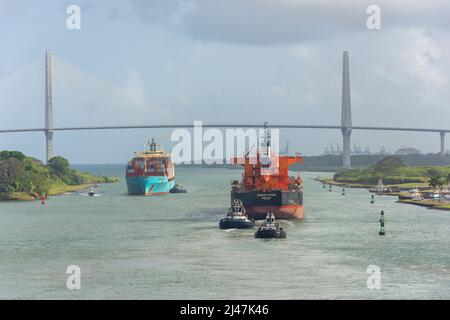 Bulk carrier ships and Puente Atlantico (Atlantic Bridge) at entrance to Panama Canal, Colon, Colon Province, Repubic of Panama, Stock Photo