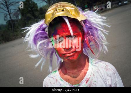 Young spray-painted boy during the Holi festival in Birgunj, Nepal Stock Photo