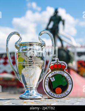 June 14, 2021, Santander, Spain. The emblem of the Racing de Santander  football club and the UEFA Champions League Cup against the backdrop of a  moder Stock Photo - Alamy
