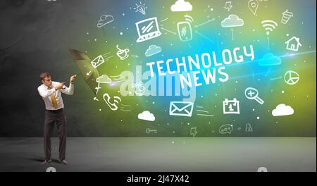 Businessman defending with umbrella, modern technology concept Stock Photo