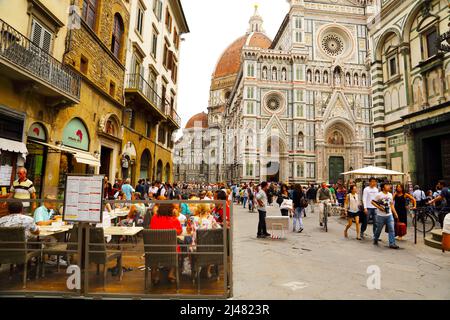 The area aound the Baptistry and Duomo in Florence, is constantly busy with tourists and locals. Stock Photo