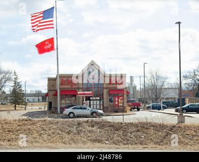 Arby's fast food restaurant flying an American Flag. Plymouth Minnesota MN USA Stock Photo