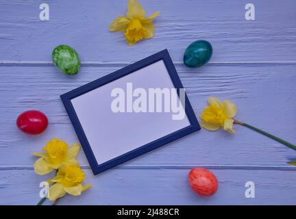Directly above shot of Easter concept with eggs and flowers Stock Photo