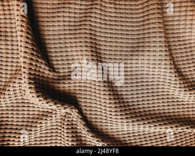 Texture of beige bed cover fabric, close up Stock Photo