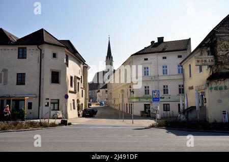 Melk, Austria - March 26, 2022: Townscape with restricted traffic area and Parish Church of the Assumption of the Virgin Mary in the UNESCO world heri Stock Photo