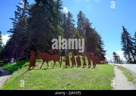 Kaunergrat, Tyrol - June 22, 2016: Iron sculptures represent a sacrificial procession from former century Stock Photo
