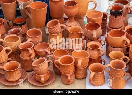 Handmade clay tea cups on display for sale at a handicraft fare at Kolkata, India Stock Photo