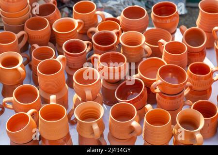 Handmade clay tea cups on display for sale at a handicraft fare at Kolkata, India Stock Photo