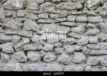 Whitewashed stone wall textures background Stock Photo