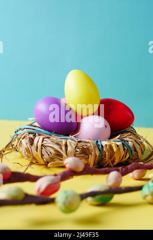 easter concept with multi color egg on color background. Stock Photo