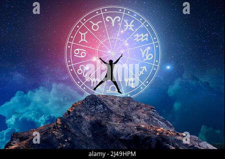 Zodiac signs inside of horoscope circle. Astrology in the sky with many stars and moons  astrology and horoscopes concept Stock Photo