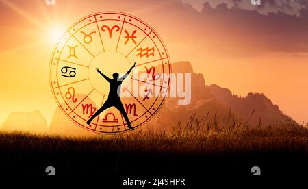 Zodiac signs inside of horoscope circle. Astrology in the sky with many stars and moons  astrology and horoscopes concept Stock Photo