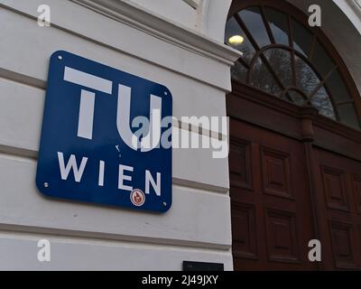 Closeup view of the blue and white colored logo of TU Wien (Vienna University of Technology) on the main building in the downtown of Vienna, Austria. Stock Photo