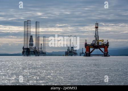 Oil rigs / drilling platforms moored in Cromarty Firth in Ross and Cromarty, Highland, Scotland, UK Stock Photo