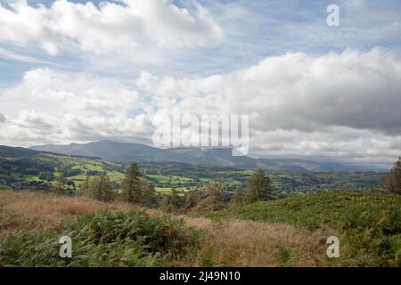 Seat Sanadal and Fairfield above Grasmere viewed fromthe slopes  Letterbarrow near Hawkshead the Lake District Cumbria England Stock Photo