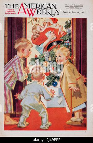 JOSEPH CHRISTIAN LEYENDECKER (American, 1874-1951). American Weekly cover, December 19, 1948. Oil on canvas. 'Kissing Santa'. Christmas number. Stock Photo