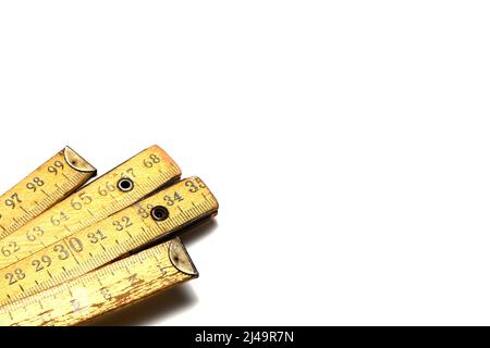 Yellow Measuring tape for tool roulette or ruler. Tape measure template in centimeters. Tapes meter set isolated on black background. Stock Photo