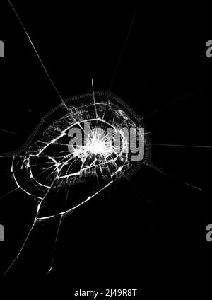 Texture of broken smartphone glass. Black background with white cracks on the screen Stock Photo