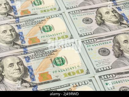 A groud of hundred dollar bills spread. Stock Photo