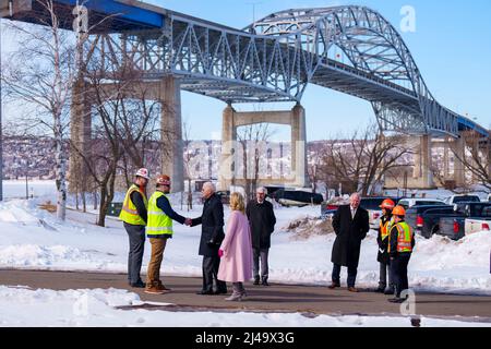 President Joe Biden and First Lady Jill Biden, joined by  Wisconsin Gov. Tony Evers and Minnesota Gov. Tim Walz, visit the John A. Blatnik Memorial Bridge that connects Duluth, Minn., to Superior, Wisconsin, Wednesday, March 2, 2022, in Superior, Wisconsin. (Official White House Photo by Adam Schultz) Stock Photo