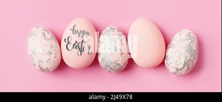 Happy Easter. Congratulatory easter background. Selective focus. Banner. Flat lay. Horizontal. Stock Photo