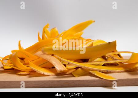 Fresh Butternut Squash peel on a wooden board Stock Photo