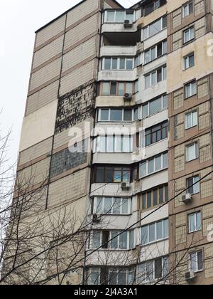 an old apartment building with many floors in the city Stock Photo