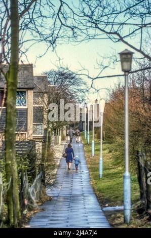 1977 archive image of pedestrian walkway through housing area at Cumbernauld New Town. Stock Photo