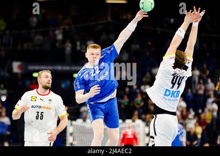 Kiel, Germany. 13th Apr, 2022. Handball: World Cup qualifier, Germany - Faroe Islands, Europe, knockout round, 3rd qualifying round, first leg, Wunderino Arena.Vilhelm Poulsen of the Faroe Islands throws at goal. Credit: Frank Molter/dpa/Alamy Live News Stock Photo